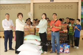 Vietnamese businesses in Laos promote social welfare initiatives